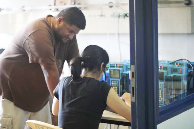 Biomedical Engineers servicing equipment in Rwanda